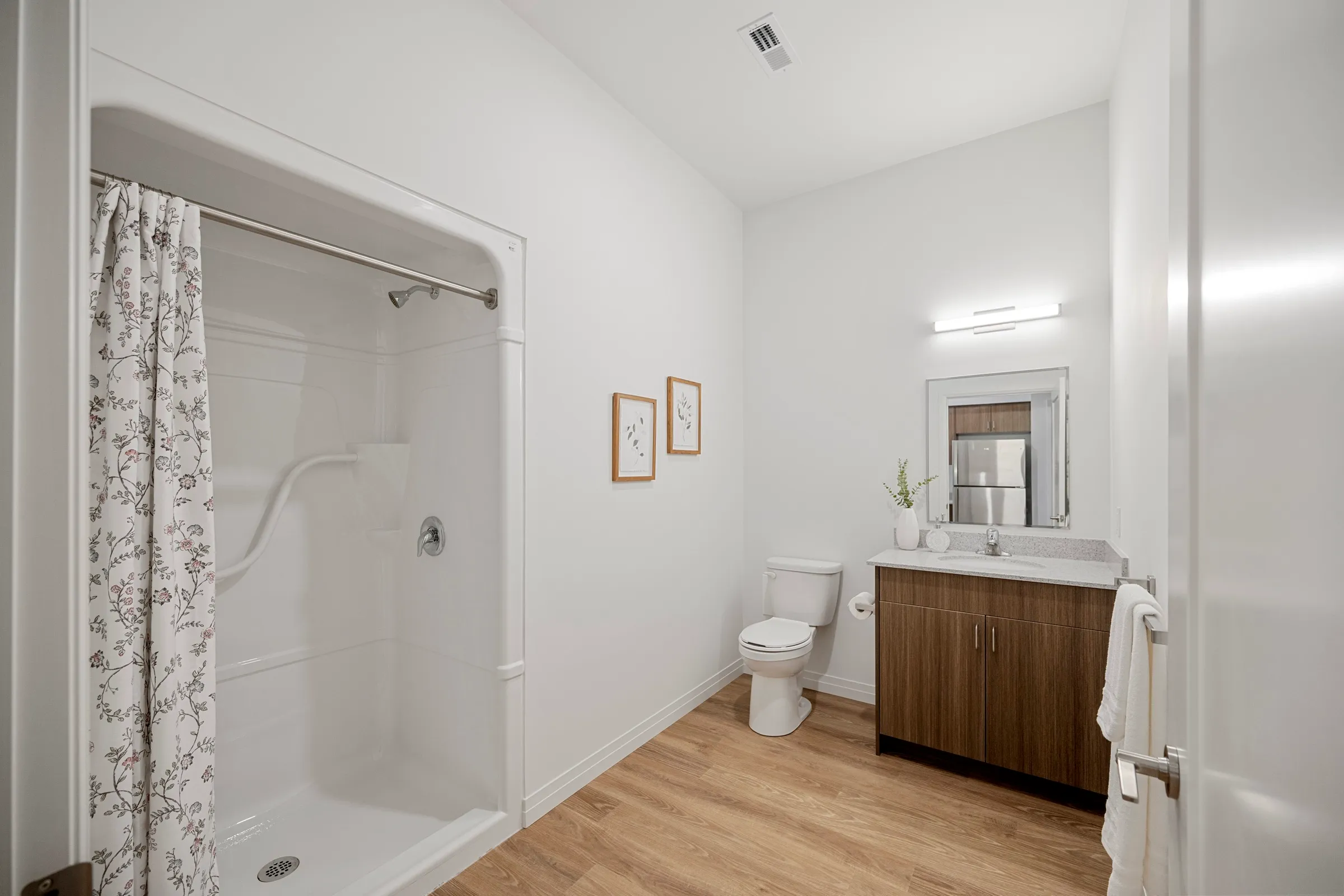 Bathroom with a freestanding tub and large format tile