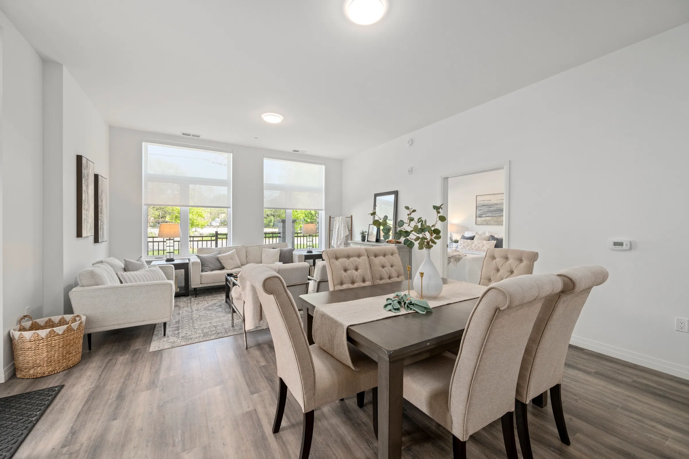 Dining area between the kitchen and the living room windows