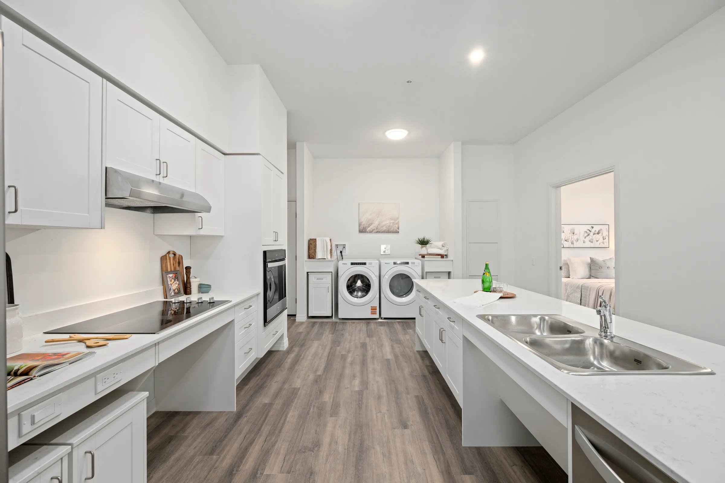 Full size washer and dryer in the suite, beside the kitchen counter