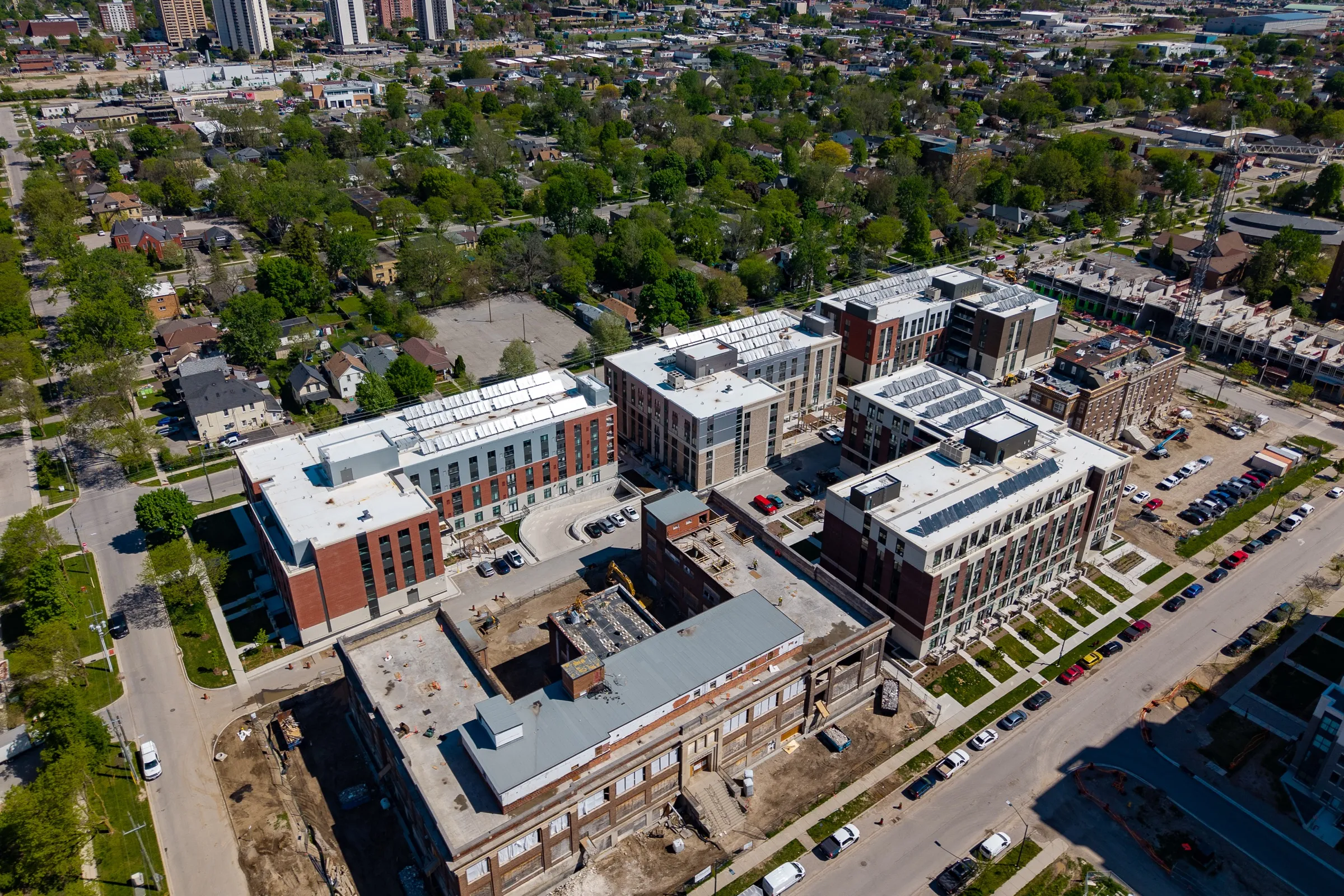 The site from the air, showing the parking areas between the buildings