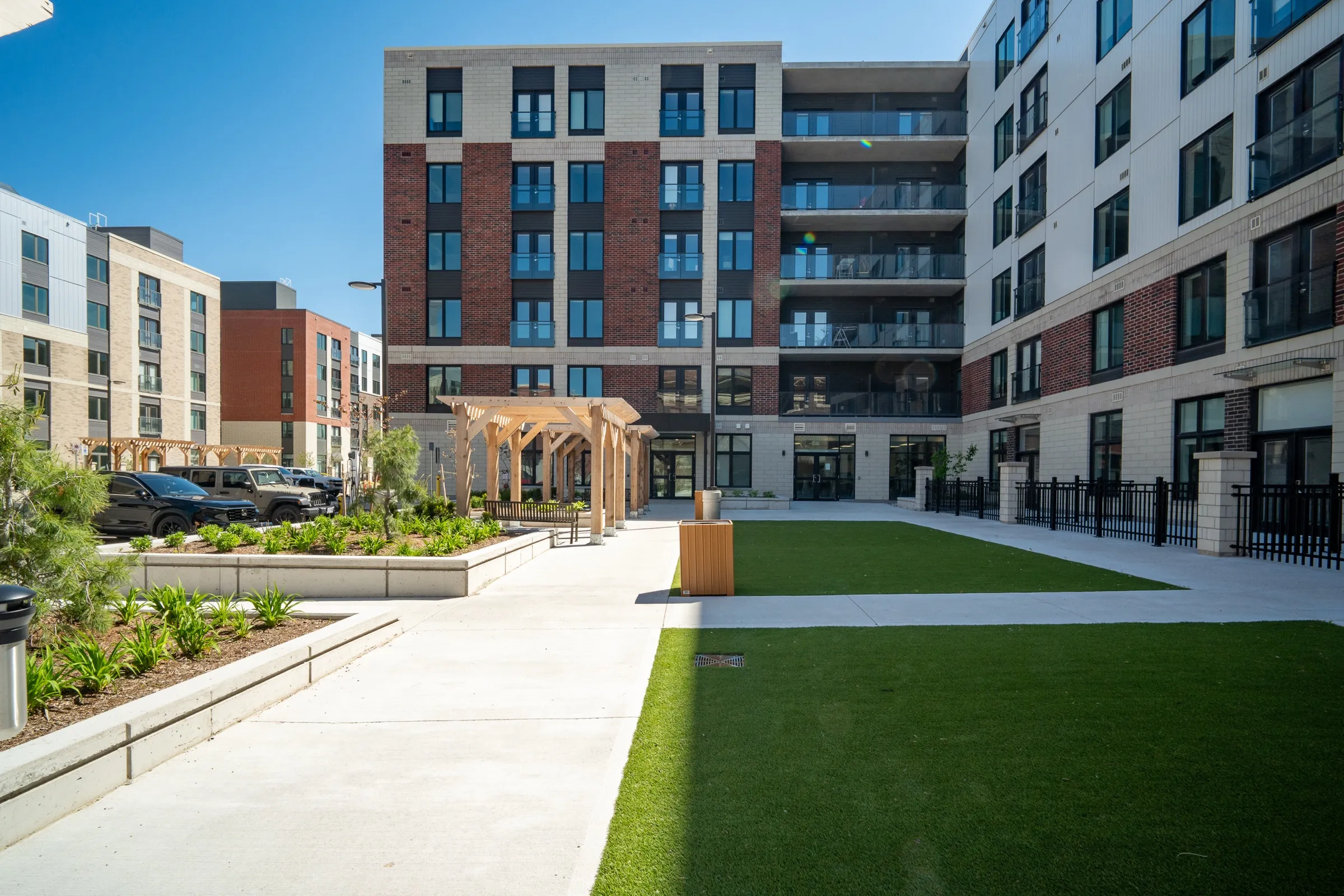 Landscaped lawn and walkways between the buildings